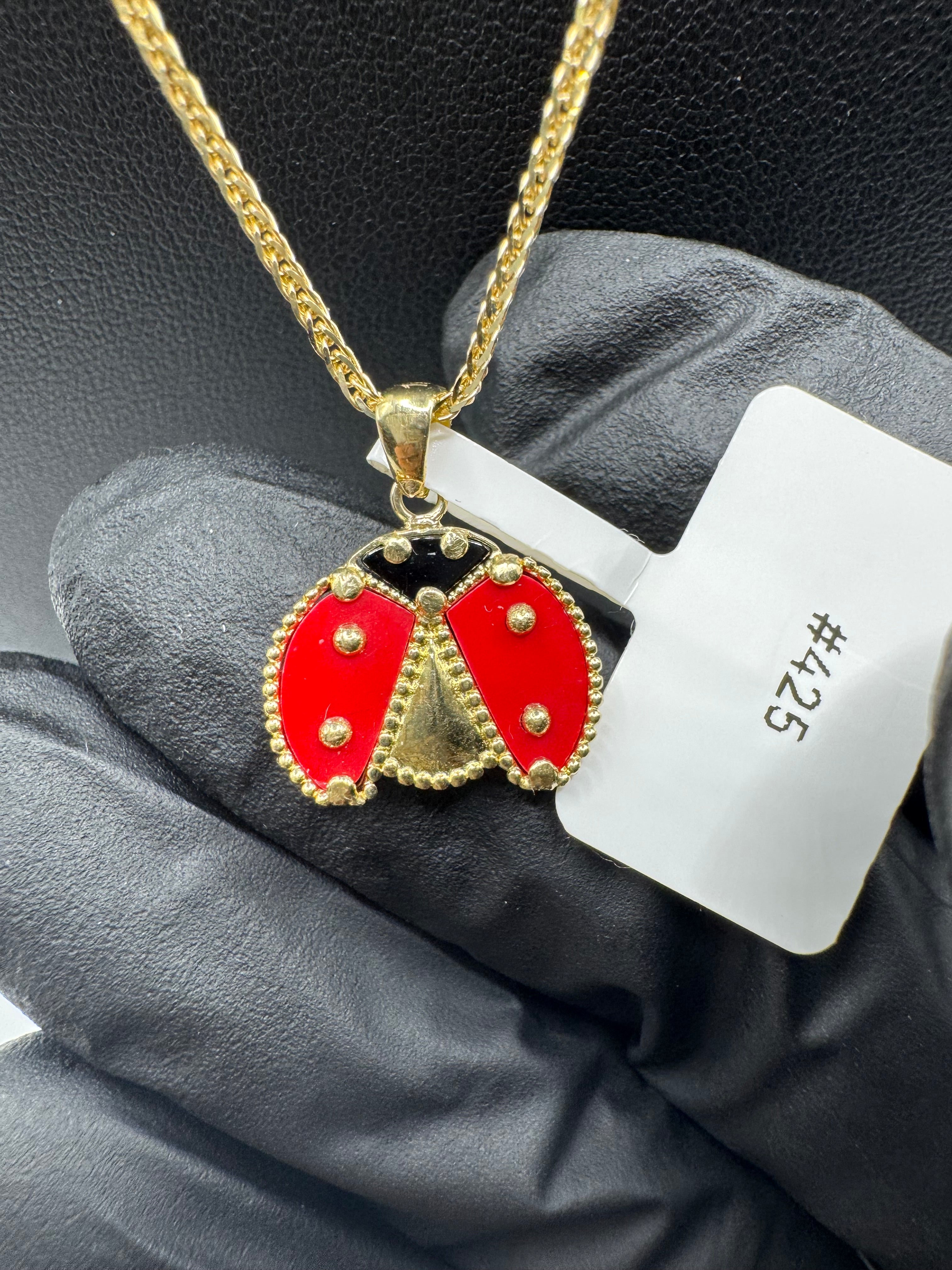 Chain with lady bug pendant